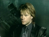 12571